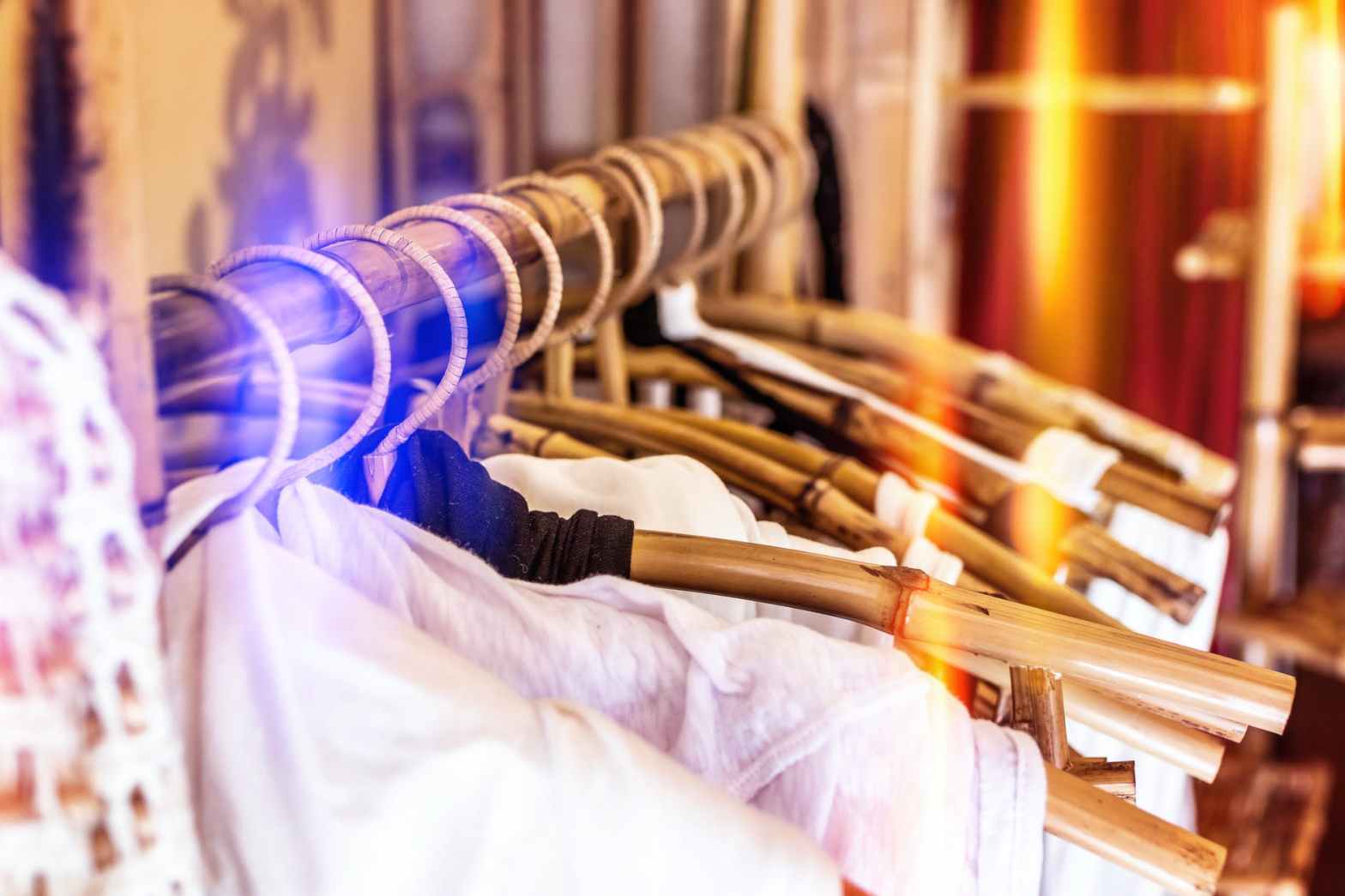 white clothes hanging on gray clothes hanger